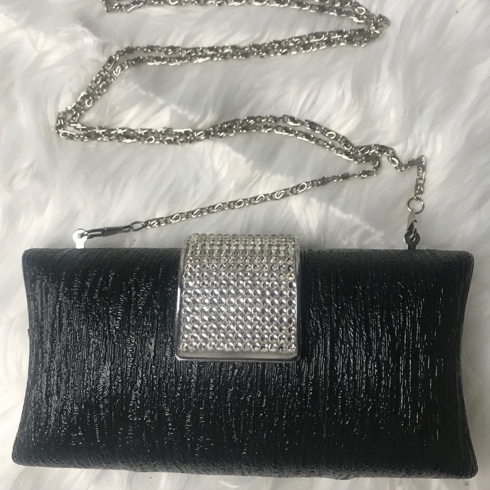 Luxurious black clutch with rhinestone clasp